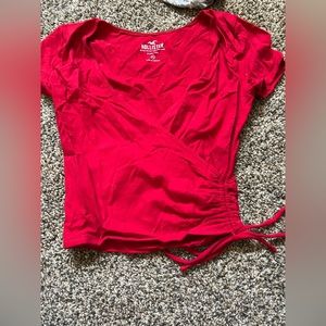 This is a super cute V- neck shirt from Hollister